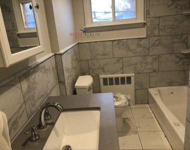 233-75 87th Avenue - Photo Thumbnail 9