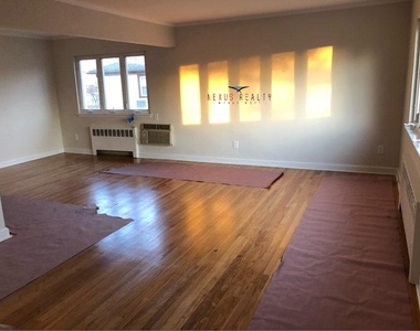 233-75 87th Avenue - Photo Thumbnail 2