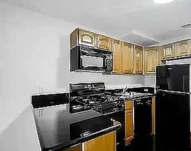 212 East 10th Street - Photo Thumbnail 2