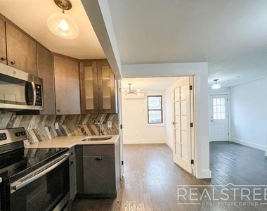 1114 Halsey Street - Photo Thumbnail 2
