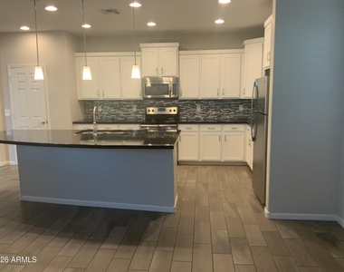 12141 W Desert Moon Way - Photo Thumbnail 3