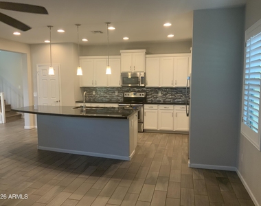 12141 W Desert Moon Way - Photo Thumbnail 2