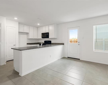 7109 Gray Wolf Lane - Photo Thumbnail 4