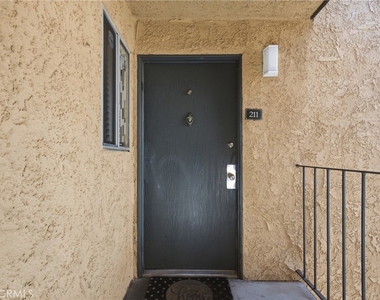 15425 Sherman Way - Photo Thumbnail 1