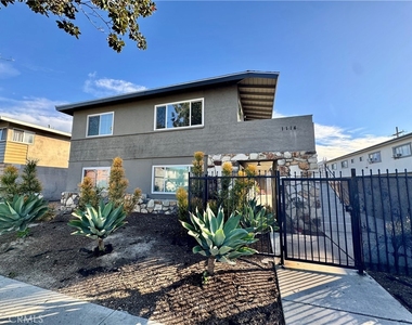 1114 N Mayfair - Photo Thumbnail 1