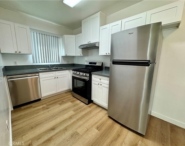 1114 N Mayfair - Photo Thumbnail 4