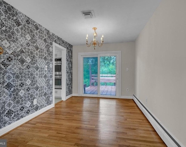 8905 Valley Forge Drive - Photo Thumbnail 5