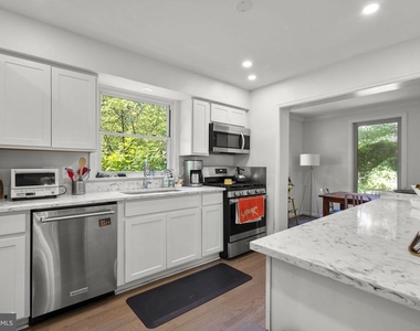 9311 Woodland Drive - Photo Thumbnail 10