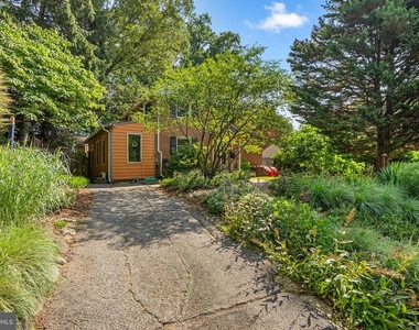 9311 Woodland Drive - Photo Thumbnail 3