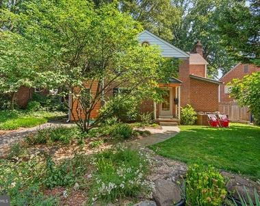 9311 Woodland Drive - Photo Thumbnail 1