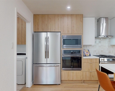 8515 Mullins Drive - Photo Thumbnail 1