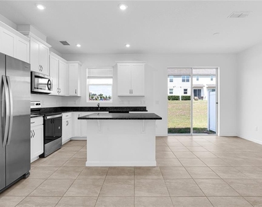 1100 Lakeshore Breeze Place - Photo Thumbnail 2