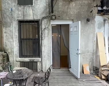 East 9th Street - Photo Thumbnail 3