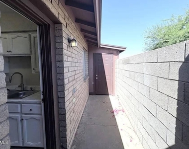 535 S Udall Unit B, Street - Photo Thumbnail 11