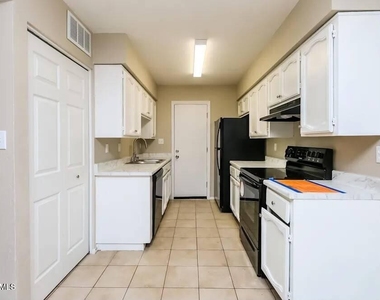535 S Udall Unit B, Street - Photo Thumbnail 2
