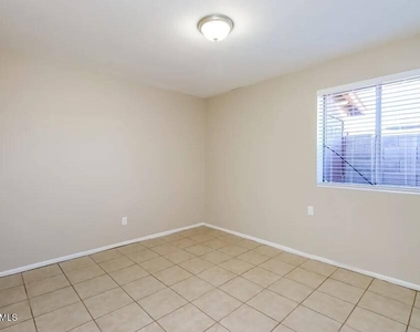 535 S Udall Unit B, Street - Photo Thumbnail 9