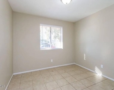 535 S Udall Unit B, Street - Photo Thumbnail 7