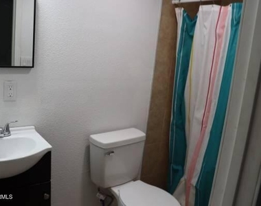 10301 E Illini Street - Photo Thumbnail 6