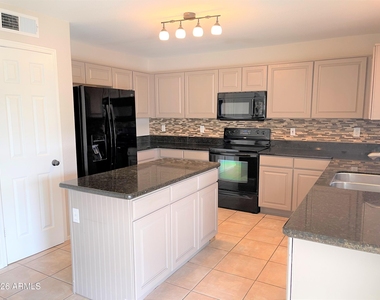 8535 W Vogel Avenue - Photo Thumbnail 5