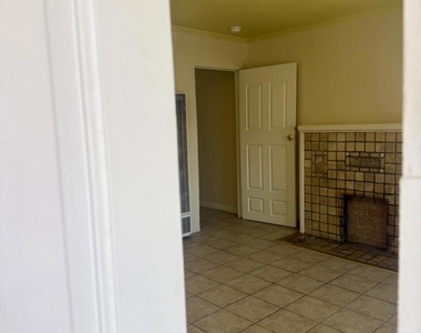 1176 W 38th Street - Photo Thumbnail 2