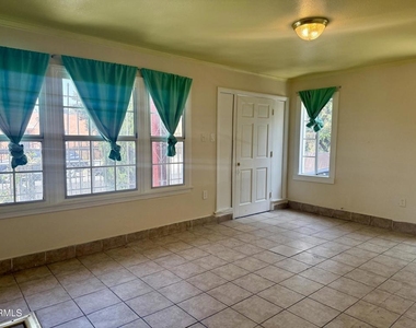 1176 W 38th Street - Photo Thumbnail 4