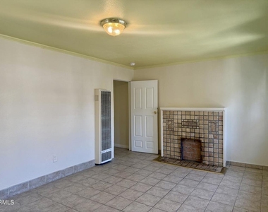 1176 W 38th Street - Photo Thumbnail 3