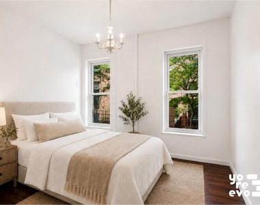 211 W 10th Street - Photo Thumbnail 4