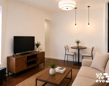 211 W 10th Street - Photo Thumbnail 1