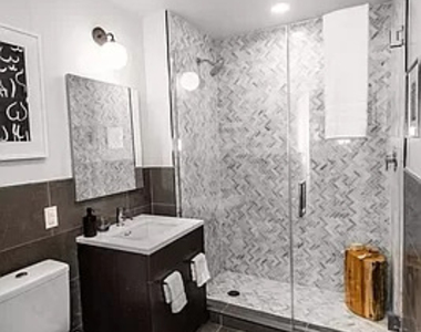 101 E 10th Street - Photo Thumbnail 8
