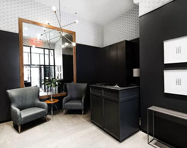 101 E 10th Street - Photo Thumbnail 11