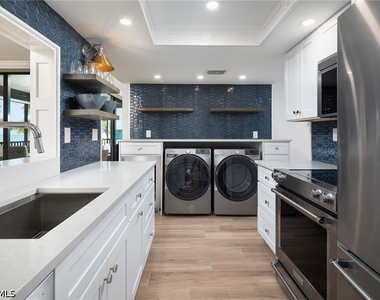 10475 Gulf Shore Drive - Photo Thumbnail 10