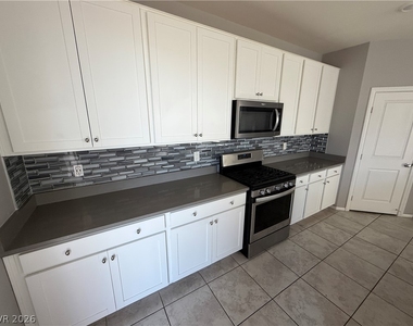 9757 W Meranto Avenue - Photo Thumbnail 3