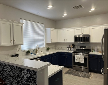 9344 Muddy Waters Avenue - Photo Thumbnail 1
