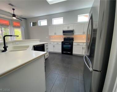 10013 Woodhouse Drive - Photo Thumbnail 4