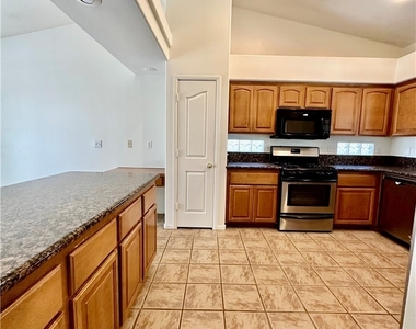 7851 Meandering Path Avenue - Photo Thumbnail 23