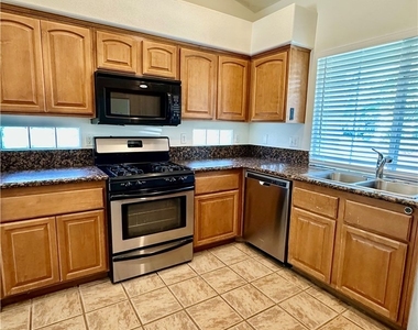 7851 Meandering Path Avenue - Photo Thumbnail 17
