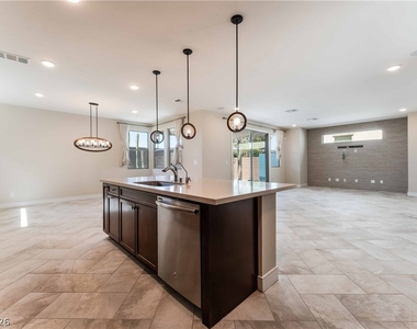 6933 Whisper Canyon Place - Photo Thumbnail 5