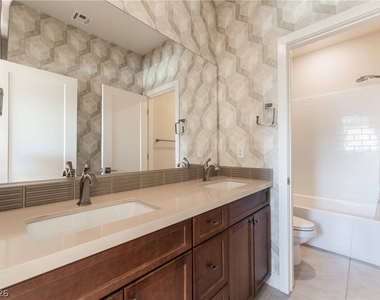 6933 Whisper Canyon Place - Photo Thumbnail 17