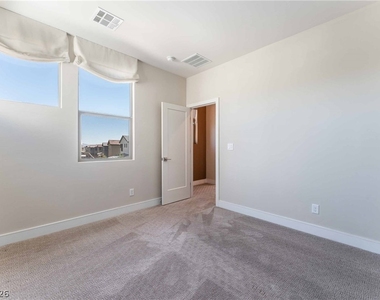 6933 Whisper Canyon Place - Photo Thumbnail 16