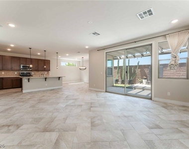 6933 Whisper Canyon Place - Photo Thumbnail 3