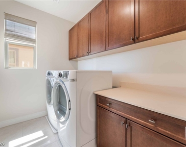 6933 Whisper Canyon Place - Photo Thumbnail 18