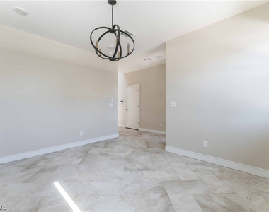 6933 Whisper Canyon Place - Photo Thumbnail 11