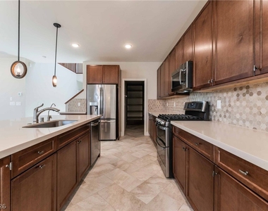 6933 Whisper Canyon Place - Photo Thumbnail 6