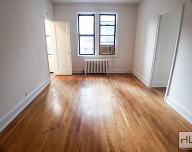 E 55 St - Photo Thumbnail 1