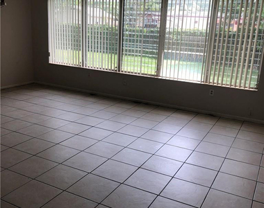 6900 Nw 14th Court - Photo Thumbnail 2