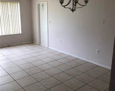 6900 Nw 14th Court - Photo Thumbnail 3