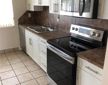 6900 Nw 14th Court - Photo Thumbnail 4