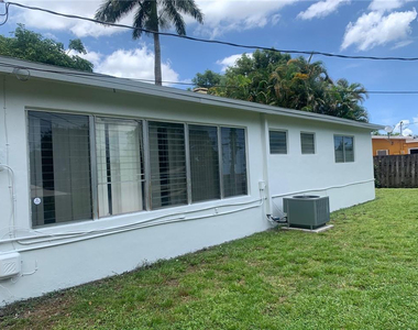 6900 Nw 14th Court - Photo Thumbnail 1