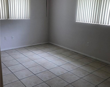 6900 Nw 14th Court - Photo Thumbnail 5