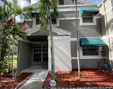 12366 Sw 51st Place - Photo Thumbnail 1